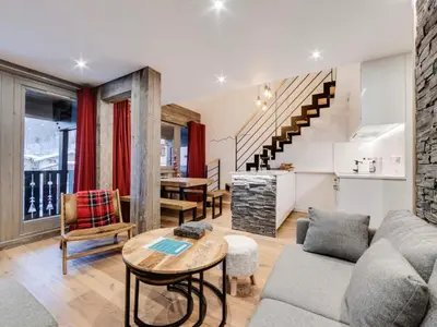 Coin salon dans l'établissement Résidence Val D'isere Village - Appartement entièrement rénové Ski aux pieds Parking couvert MAE-3043