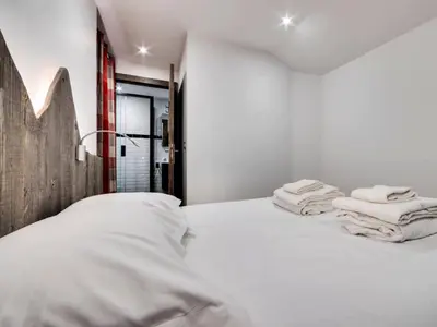 Un ou plusieurs lits dans un hébergement de l'établissement Résidence Val D'isere Village - Appartement entièrement rénové Ski aux pieds Parking couvert MAE-3043
