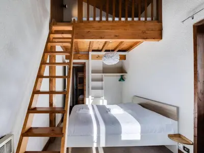 Un ou plusieurs lits dans un hébergement de l'établissement Résidence Val D'isere Village - Appartement lumineux Au pied des pistes Parking couvert MAE-3103