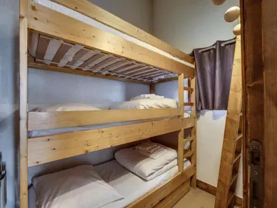 Un ou plusieurs lits dans un hébergement de l'établissement Résidence Val D'isere Village - Appartement lumineux Au pied des pistes Parking couvert MAE-3103