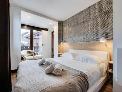Un ou plusieurs lits dans un hébergement de l'établissement Résidence Val D'isere Village - Appartement lumineux Au pied des pistes Parking couvert MAE-3113