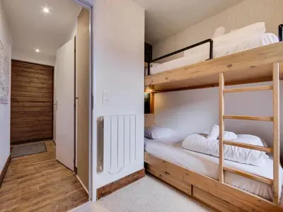 Un ou plusieurs lits dans un hébergement de l'établissement Résidence Val D'isere Village - Appartement lumineux Au pied des pistes Parking couvert MAE-3113