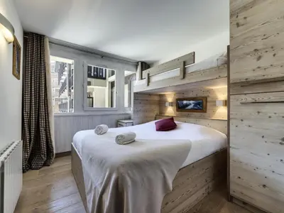 Un ou plusieurs lits dans un hébergement de l'établissement Résidence Val D'isere Village - Appartement entièrement rénové Au pied des pistes Parking couvert MAE-3123