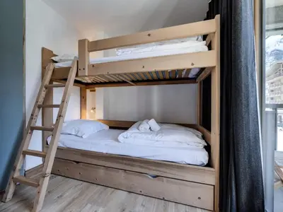 Un ou plusieurs lits dans un hébergement de l'établissement Résidence Val D'isere Village - Appartement confortable Ski aux pieds Parking couvert MAE-3303