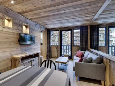 Coin salon dans l'établissement Résidence Val D'isere Village - Appartement entièrement rénové, au pied des pistes MAE-3323