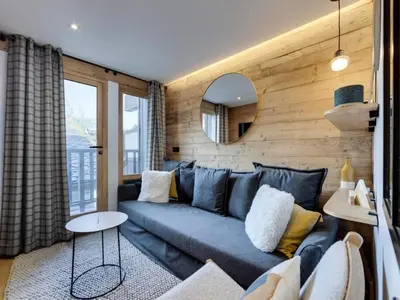 Coin salon dans l'établissement Résidence Val D'isere Village - Appartement entièrement rénové Ski aux pieds Balcon MAE-3373