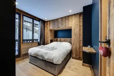Un ou plusieurs lits dans un hébergement de l'établissement Résidence Hauts Du Rogoney - Appartement entièrement rénové Proche des pistes et des commerces MAE-7403