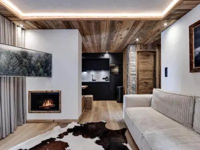 Coin salon dans l'établissement Résidence Val D'isere Village - Appartement entièrement rénové Ski aux pieds Parking couvert MAE-7413