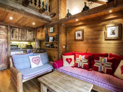 Coin salon dans l'établissement Chalet Lecommandeur - Appartement duplex confortable Ski aux pieds Balcon MAE-7423