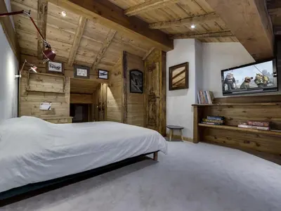 Un ou plusieurs lits dans un hébergement de l'établissement Chalet Lecommandeur - Appartement duplex confortable Ski aux pieds Balcon MAE-7423