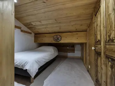 Un ou plusieurs lits dans un hébergement de l'établissement Chalet Lecommandeur - Appartement duplex confortable Ski aux pieds Balcon MAE-7423