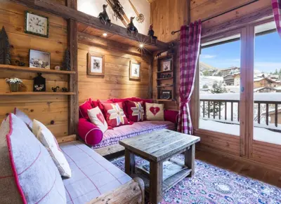 Coin salon dans l'établissement Chalet Lecommandeur - Appartement duplex confortable Ski aux pieds Balcon MAE-7423