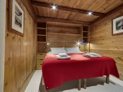Un ou plusieurs lits dans un hébergement de l'établissement Chalet Lecommandeur - Appartement duplex confortable Ski aux pieds Balcon MAE-7423