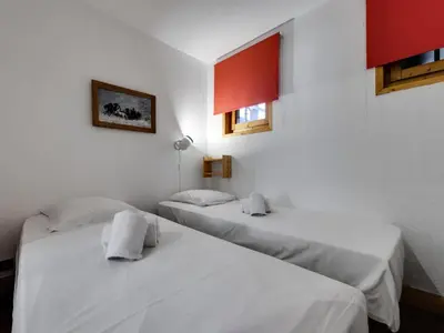 Un ou plusieurs lits dans un hébergement de l'établissement Résidence Val D'isere Village - Appartement Duplex confortable Ski aux pieds Parking couvertAppartement Duplex confortable Ski aux pieds Parking couvert MAE-7463