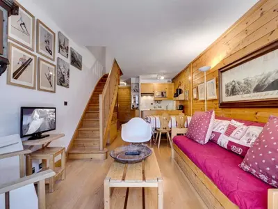 Coin salon dans l'établissement Résidence Val D'isere Village - Appartement Duplex confortable Ski aux pieds Parking couvertAppartement Duplex confortable Ski aux pieds Parking couvert MAE-7463