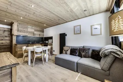 Télévision ou salle de divertissement dans l'établissement Résidence Val D'isere Village - Appartement entièrement rénové Ski aux pieds Parking couvert MAE-7483