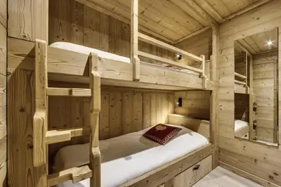 Un ou plusieurs lits dans un hébergement de l'établissement Résidence Val D'isere Village - Appartement entièrement rénové Ski aux pieds Parking couvert MAE-7483