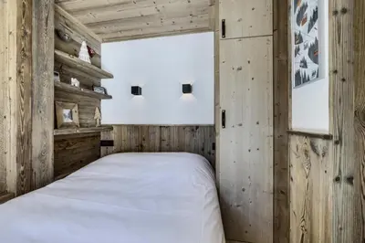 Un ou plusieurs lits dans un hébergement de l'établissement Résidence Val D'isere Village - Appartement entièrement rénové Ski aux pieds Parking couvert MAE-7483