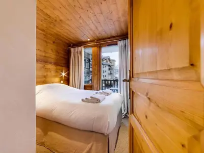 Un ou plusieurs lits dans un hébergement de l'établissement Résidence Val D'isere Village - Appartement lumineux Ski aux pieds Parking couvert MAE-7503