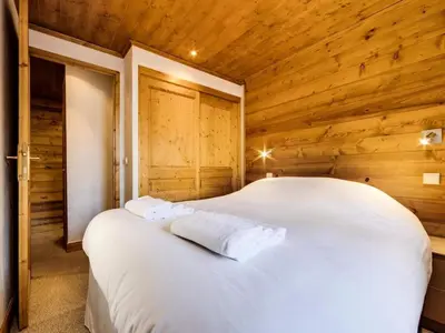Un ou plusieurs lits dans un hébergement de l'établissement Résidence Val D'isere Village - Appartement lumineux Ski aux pieds Parking couvert MAE-7503