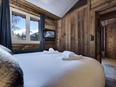 Un ou plusieurs lits dans un hébergement de l'établissement Chalet De Bellevarde - Appartement agréable Centre station MAE-7353
