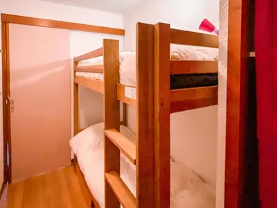 Un ou plusieurs lits dans un hébergement de l'établissement Studio cosy pour 2 pers. au Val Claret, proche des pistes - FR-1-411-993