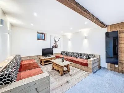 Télévision ou salle de divertissement dans l'établissement Chalet Chalet La Bergerie by Interhome