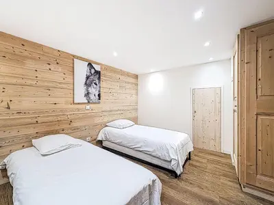 Un ou plusieurs lits dans un hébergement de l'établissement Chalet Chalet La Bergerie by Interhome