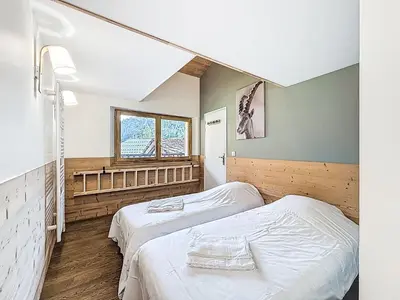 Un ou plusieurs lits dans un hébergement de l'établissement Chalet Chalet La Bergerie by Interhome