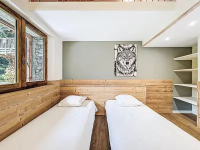Un ou plusieurs lits dans un hébergement de l'établissement Chalet Chalet La Bergerie by Interhome