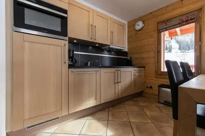 Cuisine ou kitchenette dans l'établissement Les Chalet De Flambeau - Appartement 3 pièces - 6 personnes MAE-9473