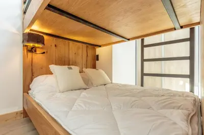 Un ou plusieurs lits dans un hébergement de l'établissement Mio – Loft alpin lumineux avec vue montagne