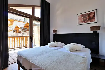 Un ou plusieurs lits dans un hébergement de l'établissement Mio – Loft alpin lumineux avec vue montagne