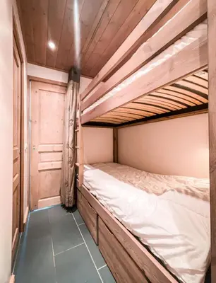 Un ou plusieurs lits dans un hébergement de l'établissement Résidence Saint Michel - Charmant appartement 2 pièces 6 personnes au calme avec garage, offrant une vue sur les montagnes, proche des pistes, dans le qu MAE-6743