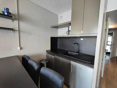 Cuisine ou kitchenette dans l'établissement Appartement plein sud ARC 2000