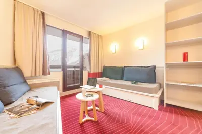 Coin salon dans l'établissement Résidence La Daille - Val-d'Isère