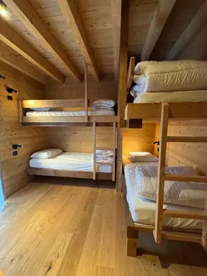 Un ou plusieurs lits superposés dans un hébergement de l'établissement Somptueux Chalet 12 personnes - Villaroger