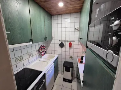 Cuisine ou kitchenette dans l'établissement Superbe appartement 8 personnes - Skis aux pieds