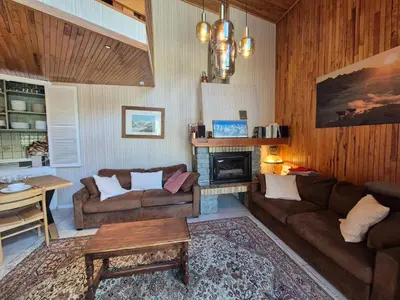 Coin salon dans l'établissement Superbe appartement 8 personnes - Skis aux pieds
