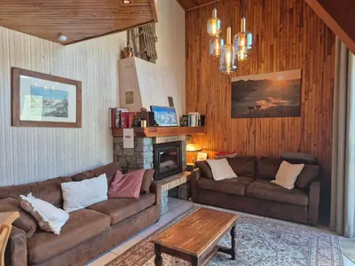Coin salon dans l'établissement Superbe appartement 8 personnes - Skis aux pieds