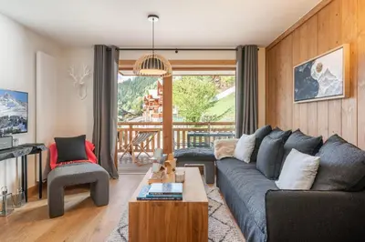 Coin salon dans l'établissement Apartment Tilia Champagny-en-Vanoise - by EMERALD STAY
