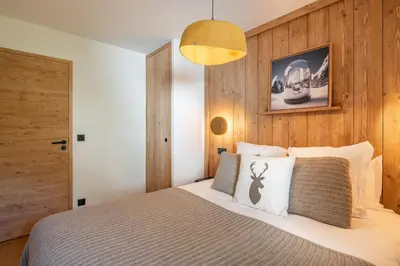 Un ou plusieurs lits dans un hébergement de l'établissement Apartment Tilia Champagny-en-Vanoise - by EMERALD STAY