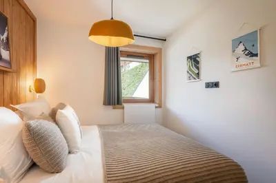 Un ou plusieurs lits dans un hébergement de l'établissement Apartment Tilia Champagny-en-Vanoise - by EMERALD STAY