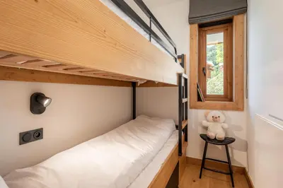 Un ou plusieurs lits dans un hébergement de l'établissement Apartment Tilia Champagny-en-Vanoise - by EMERALD STAY