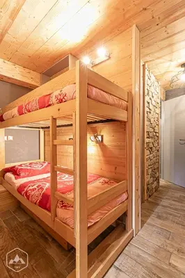 Un ou plusieurs lits dans un hébergement de l'établissement Cozy Studio 2-4 people Aussois - L'Eterlou