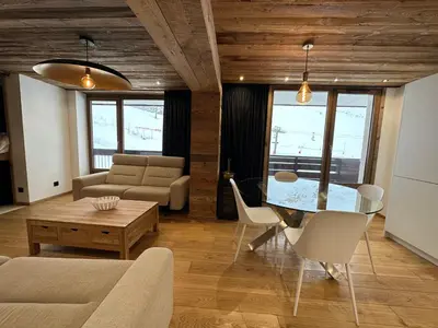 Coin salon dans l'établissement Appartement cosy-spa wellness sur les pistes