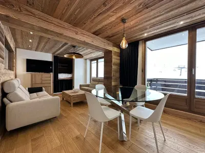 Coin salon dans l'établissement Appartement cosy-spa wellness sur les pistes