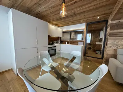 Cuisine ou kitchenette dans l'établissement Appartement cosy-spa wellness sur les pistes