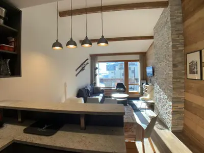 Coin salon dans l'établissement MyHome - Spacieux T4 rénové au cœur du Val Claret - 8pax
