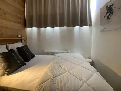 Un ou plusieurs lits dans un hébergement de l'établissement MyHome - Spacieux T4 rénové au cœur du Val Claret - 8pax